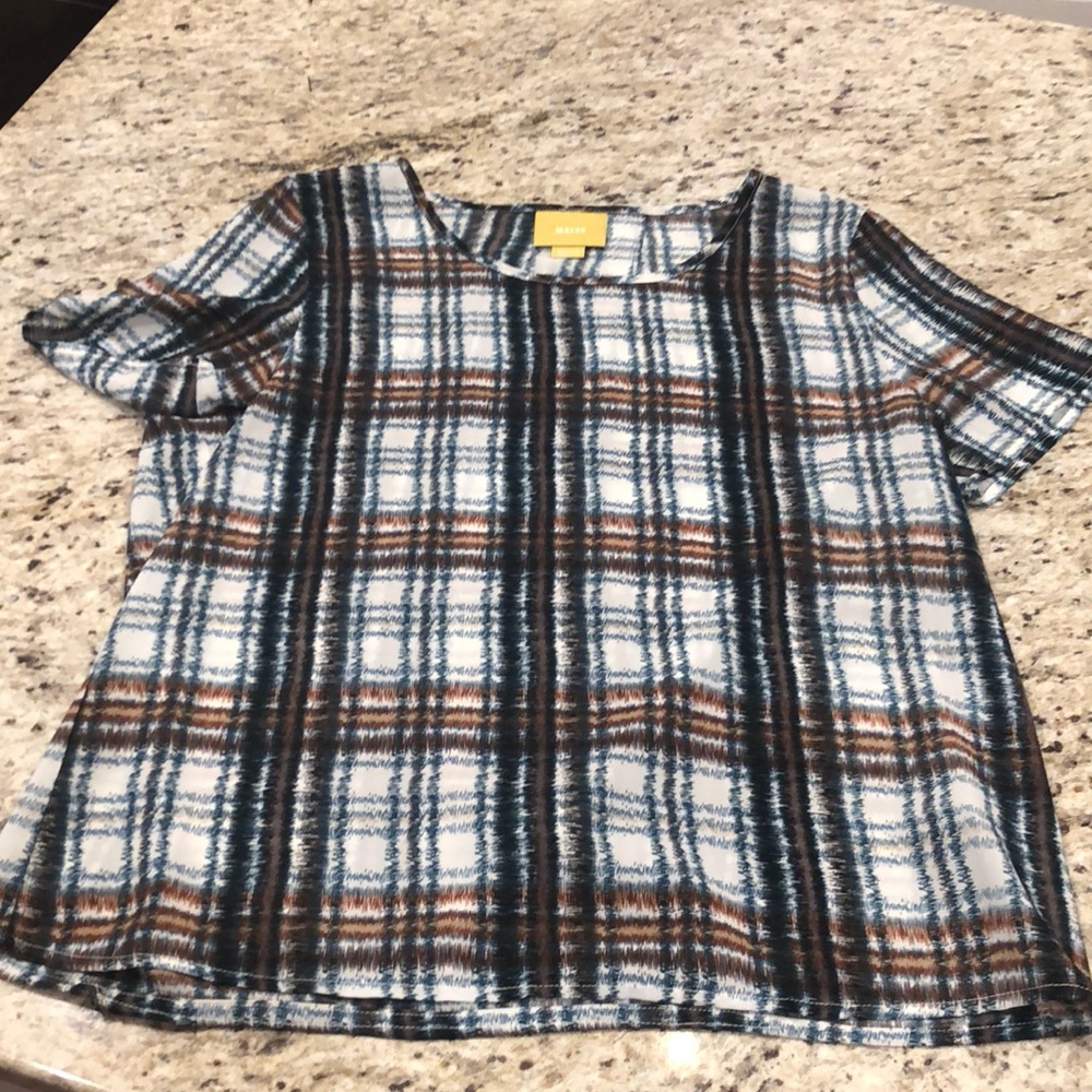 Maeve blouse from Anthropologie.